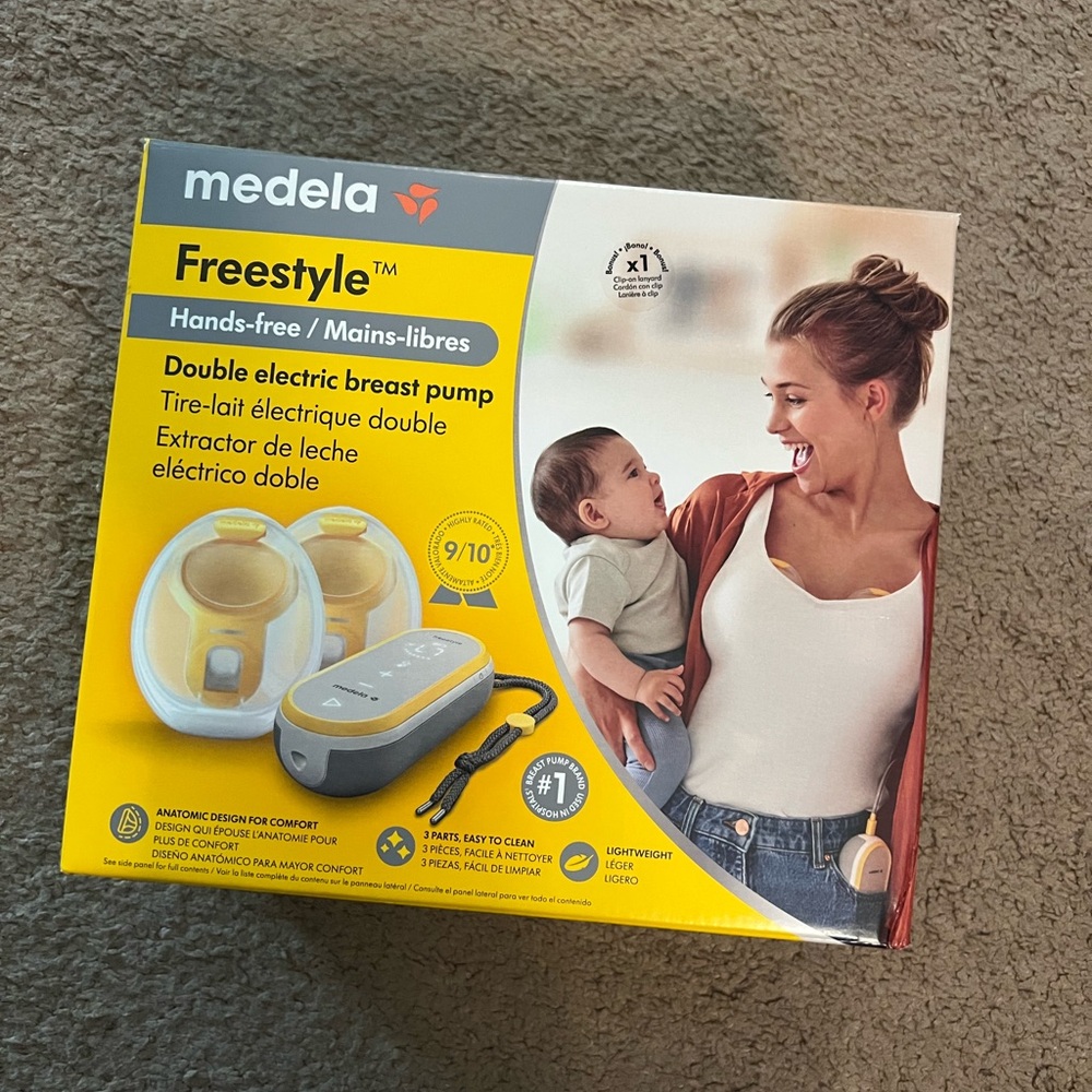 Medela Freestyle wearable/portable pump with extra new parts, like new condition